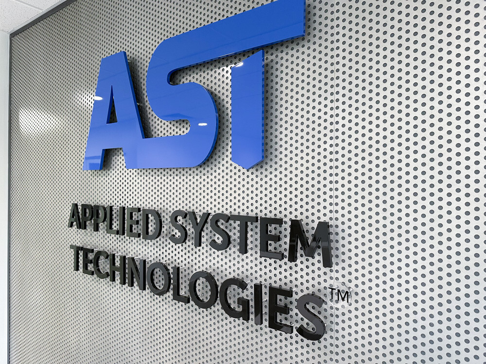 Dimensional logo mounted on wall