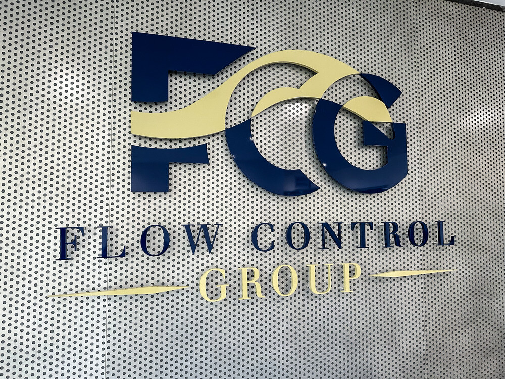 Dimensional logo mounted on wall